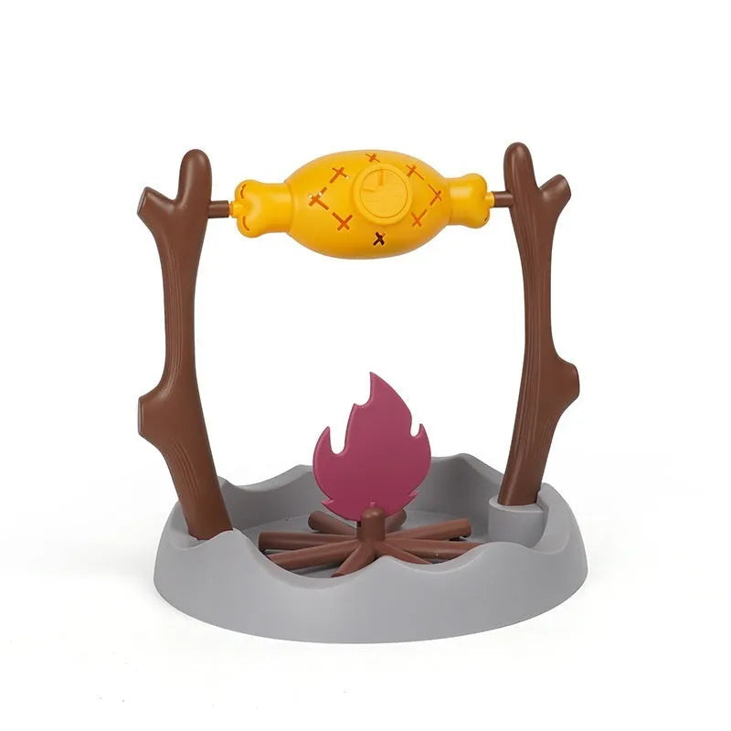 Barbecue-shaped plastic cat feeder toy for dispensing dry kibble during play.