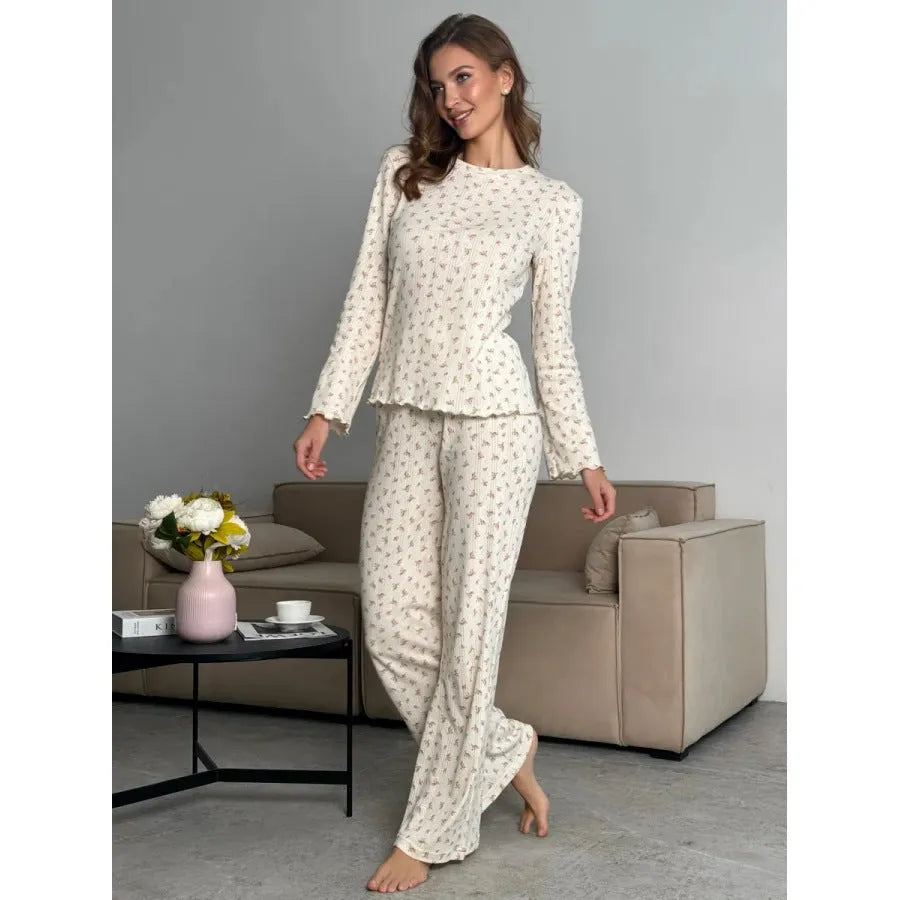 White floral print women's loungewear set with bell sleeve top and wide-leg trousers