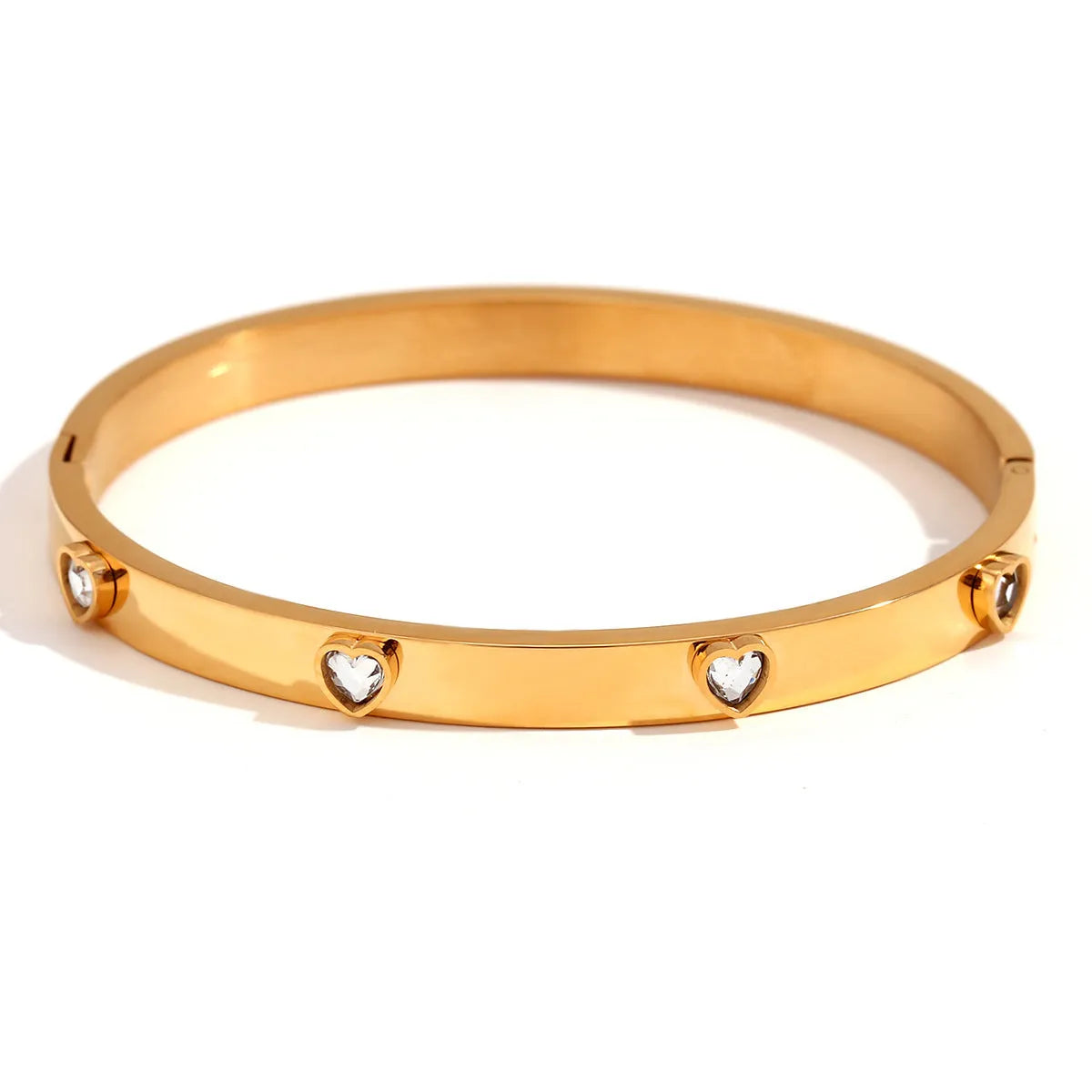 Stainless steel bracelet with micro-inlaid peach heart design in green or white diamond colour options