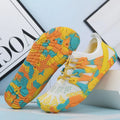Men's and women's quick-drying mesh beach shoes in various colours with lace-up front and textured rubber sole.