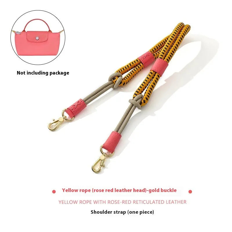 Braided nylon and cowhide leather crossbody shoulder strap with gold alloy buckle on a grey background.