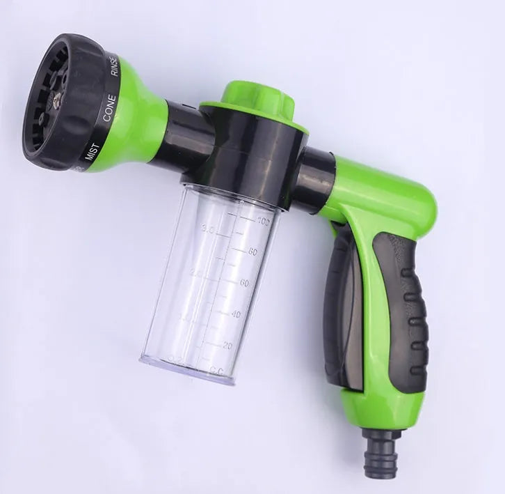 Green high-pressure foam spray water gun with adjustable nozzle for car and garden cleaning.