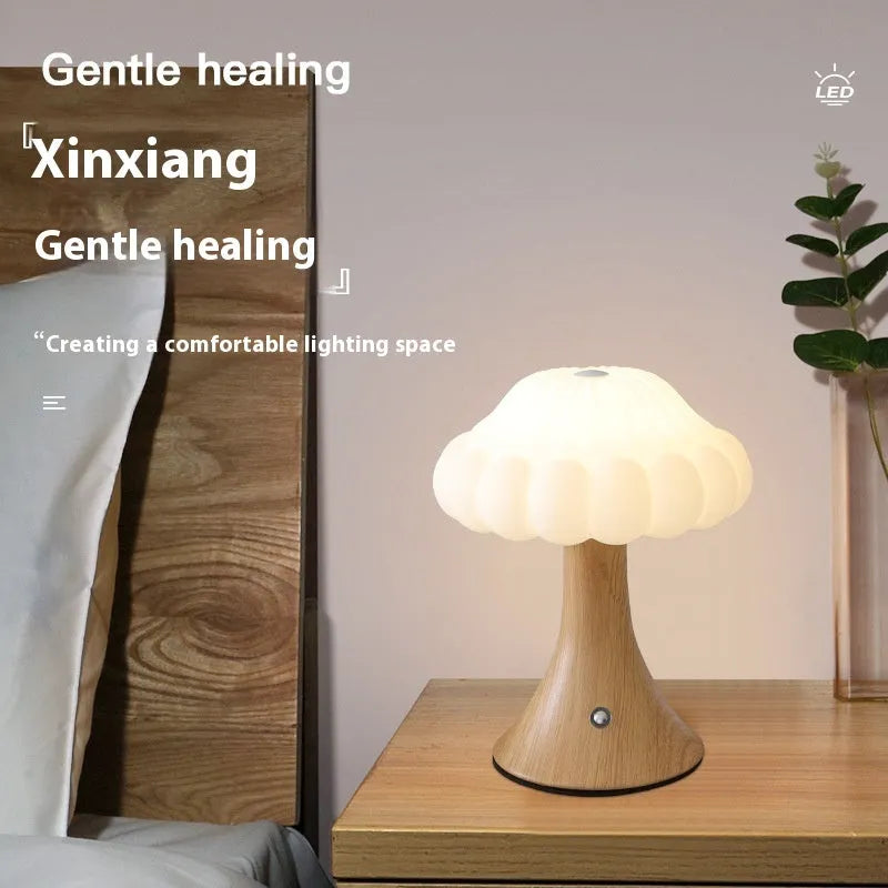 Mushroom-shaped night light with USB charging port and touch controls in five colour options