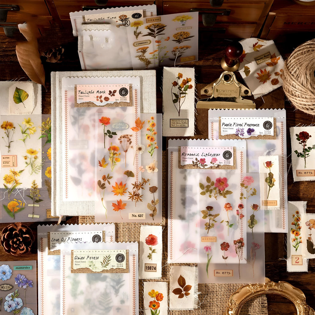 Huazhisen Series sticker material pack showing forest label designs on transfer paper and cotton linen sheets