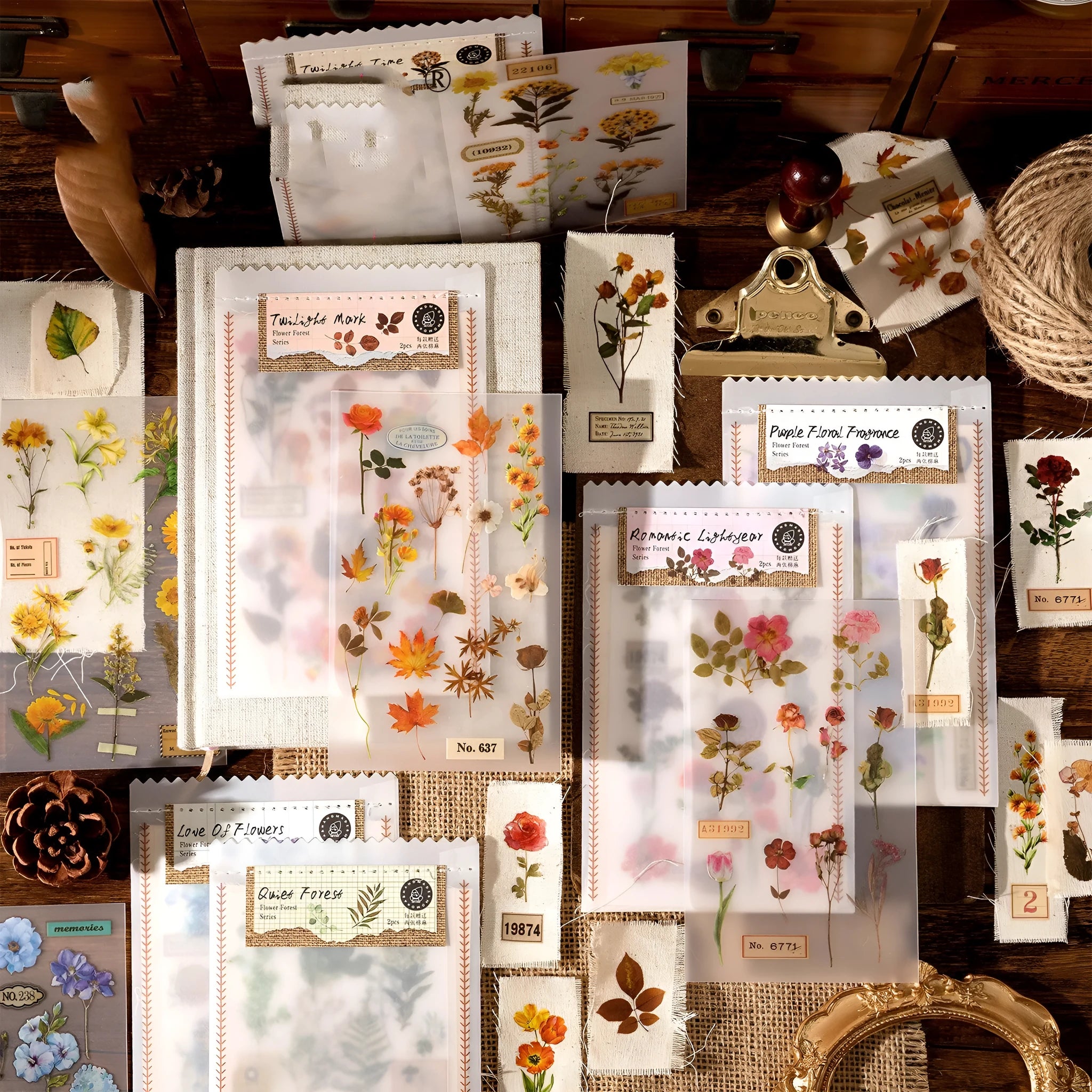 Huazhisen Series sticker material pack showing forest label designs on transfer paper and cotton linen sheets