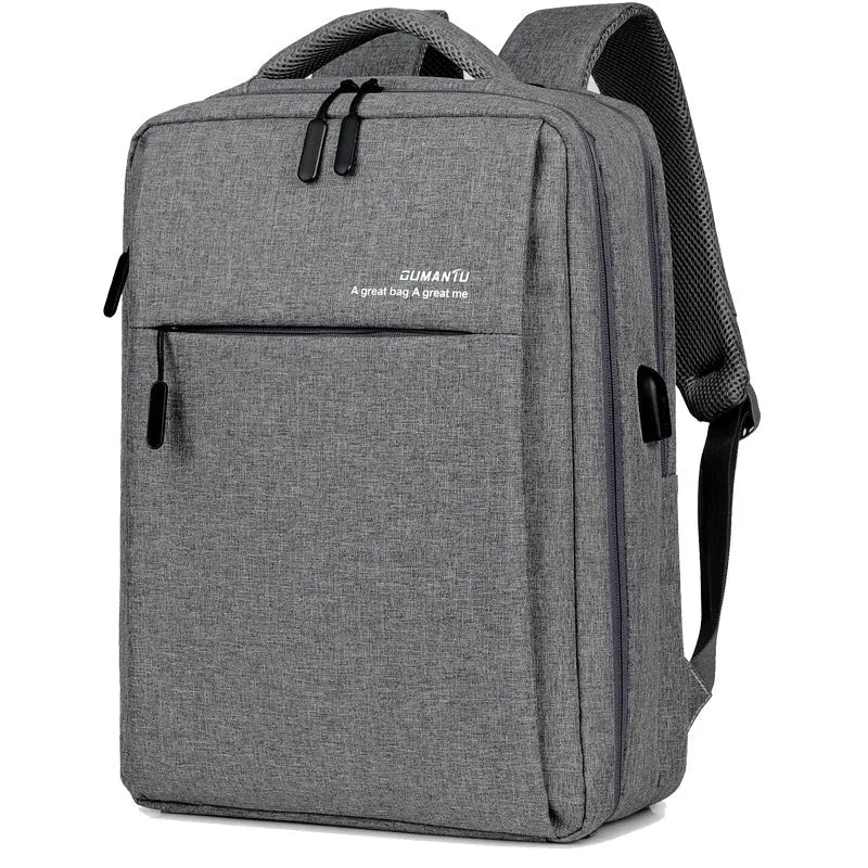 Black waterproof rechargeable backpack for a laptop, showing shoulder straps and a USB charging port.