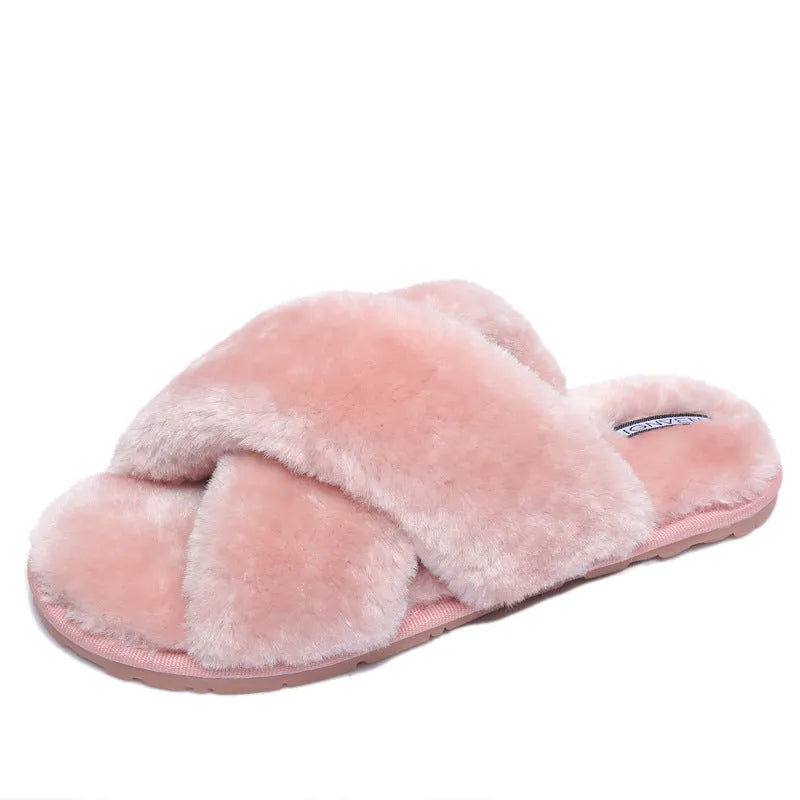 Cross open-toe fur slippers in various colours on a non-slip patterned rubber sole.