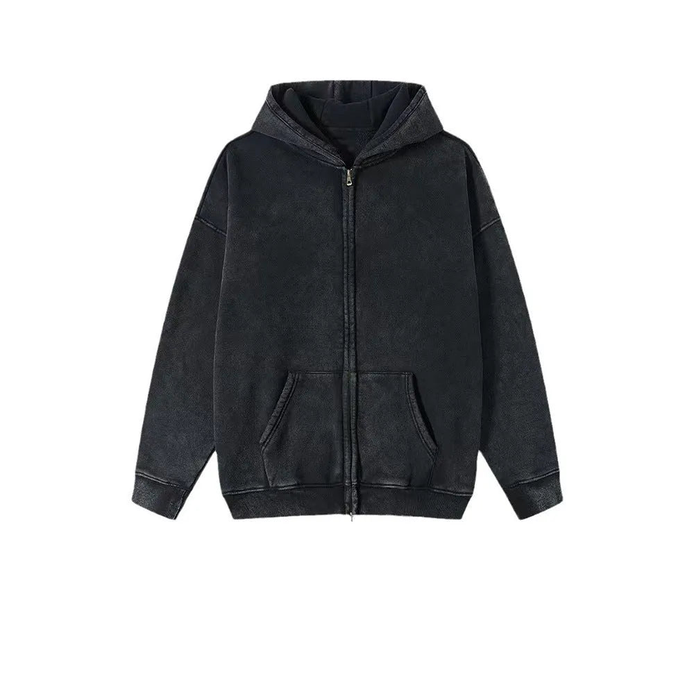 Man wearing a washed black fleece-lined cotton hooded cardigan with a double zipper.