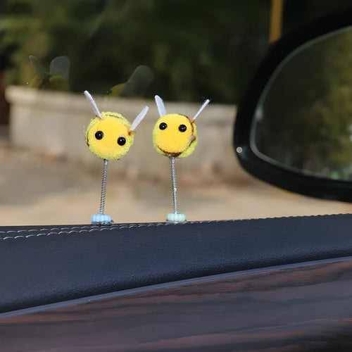 Swing spring bee car decoration made from a fur ball, measuring 3cm by 3cm.