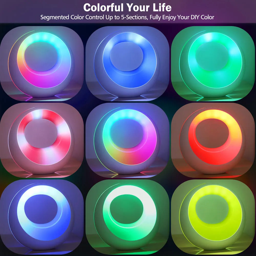 Small RGB colour changing night lamp with remote control on bedside table