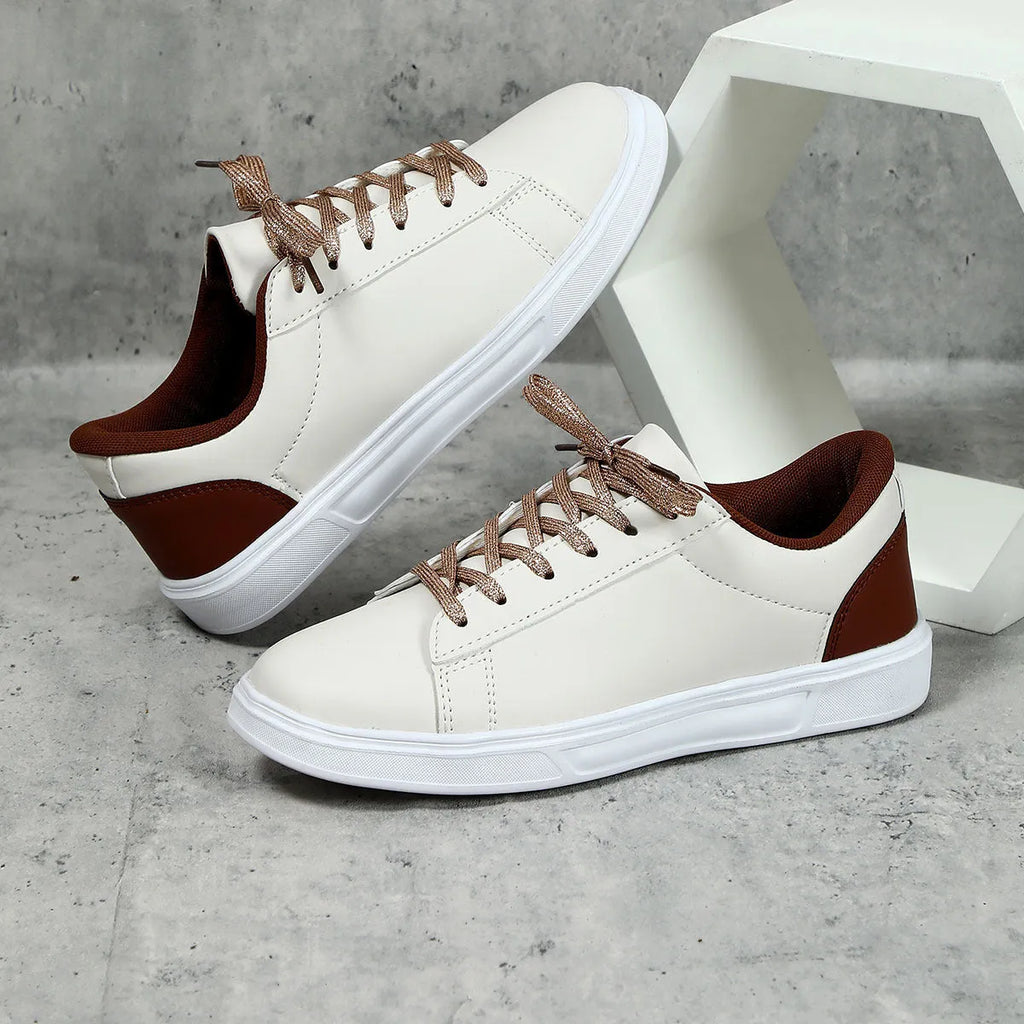 Platform skateboard sneakers in beige brown with cross strap and rubber sole