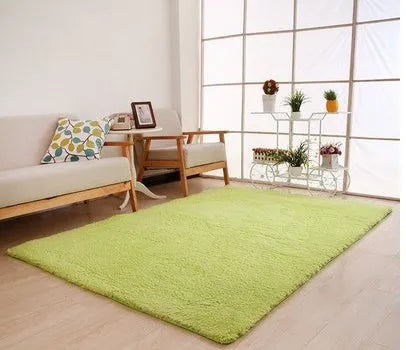White plush rectangular area rug with a dotted non-slip bottom, shown at 40cm x 40cm size.
