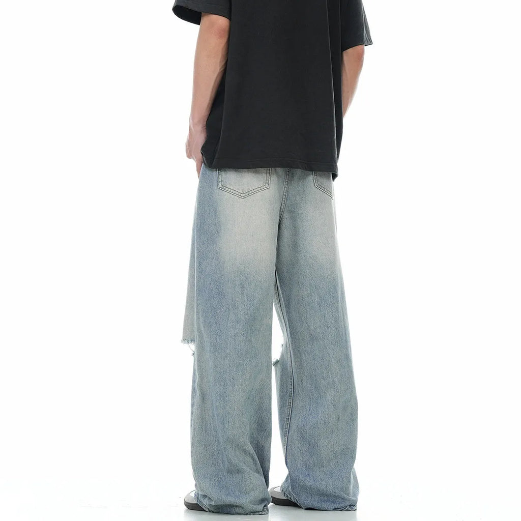 Blue men's straight-leg jeans with ripped detailing and an adjustable waistband.