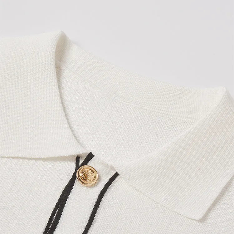 White cardigan with contrast colour lapels and short sleeves laid flat