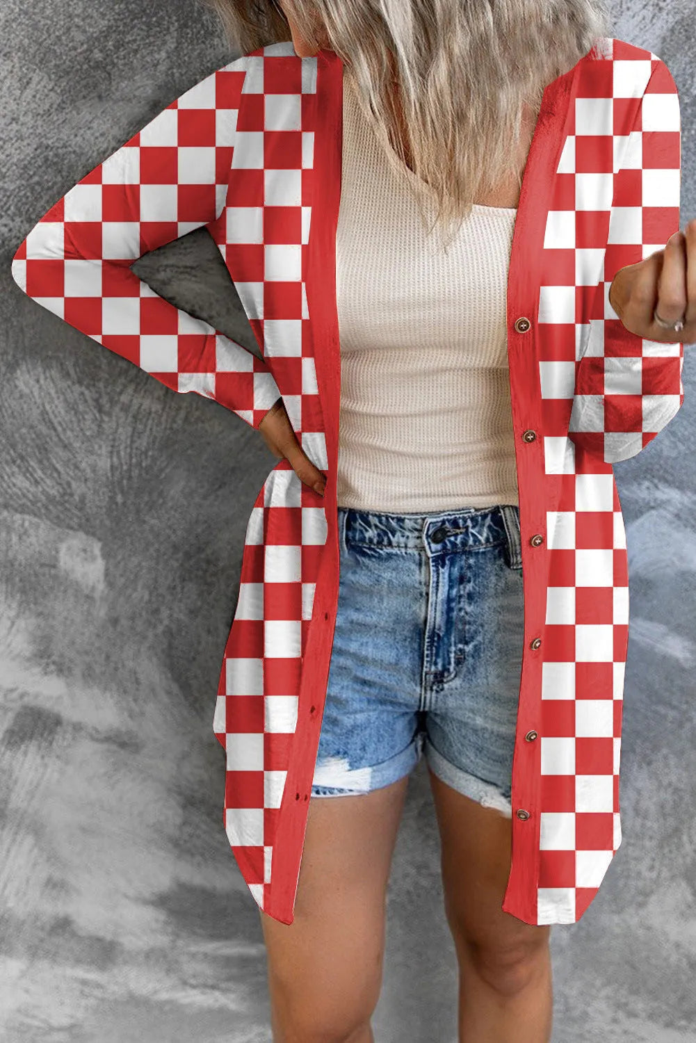 Women's long grey plaid pattern knitted cardigan coat with regular sleeves, shown on a model.