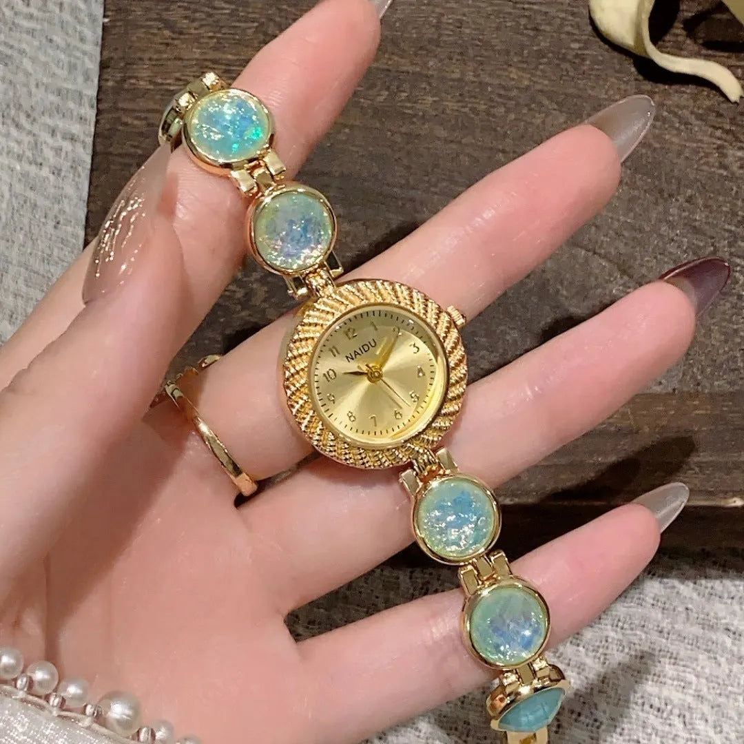 Women's quartz watch with 25mm round dial in one of six colours including milky white and dark green