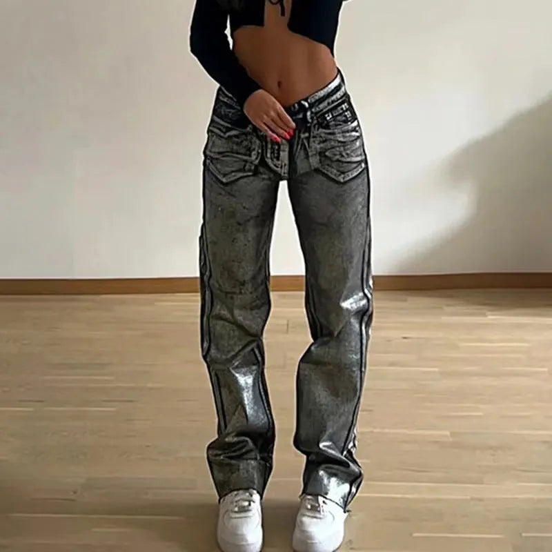 Blue high waist straight leg women's jeans with silver contrast stitching on denim fabric
