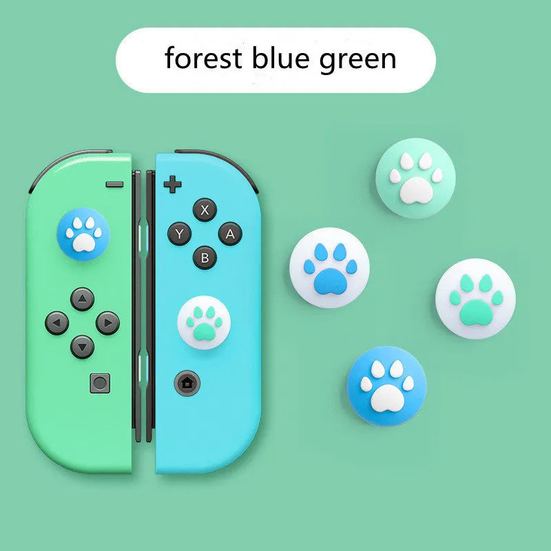 Four silicone rocker caps for Nintendo Switch Joy-Con controllers in assorted colours on a grey background.