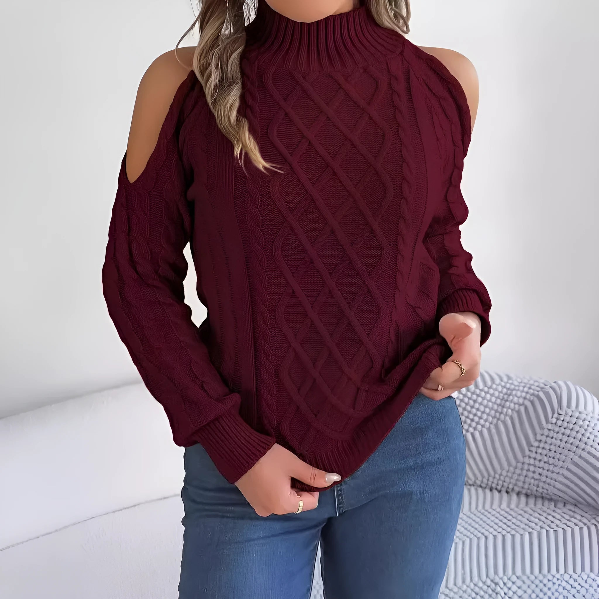 Women's twisted knit sweater with strapless half-high collar and long lantern sleeves in acrylic