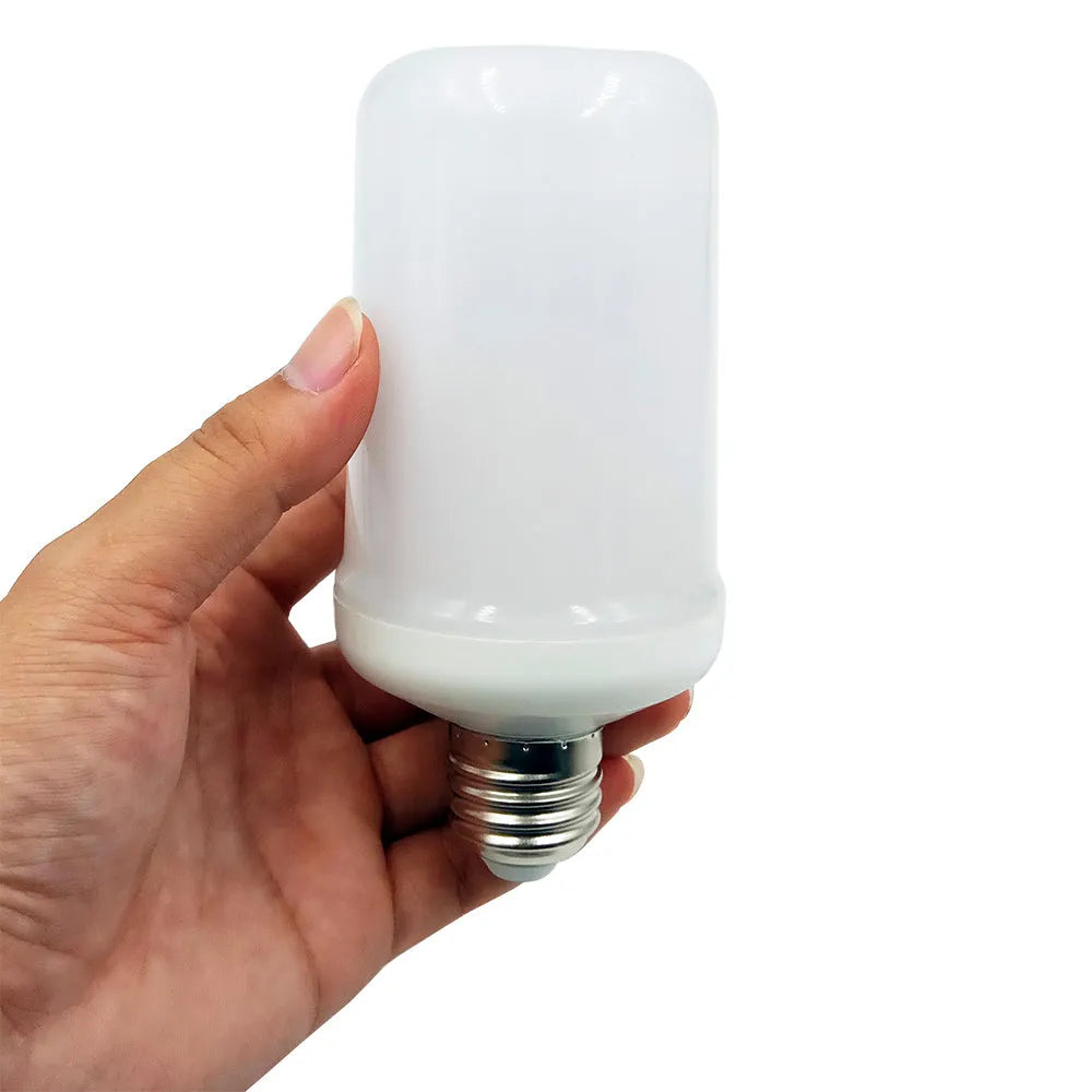 Decorative indoor lamp with glowing orange LED flame effect bulb on a dark surface.
