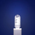 Small white USB-powered LED baby night light on a table