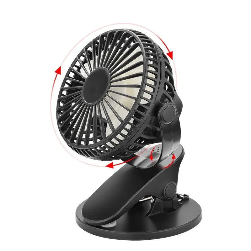 White USB clip fan with plastic blades mounted on desk edge showing piano button switch