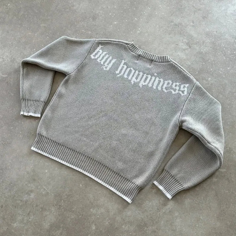 Grey loose-fitting jacquard pattern knitwear coat with long sleeves on hanger