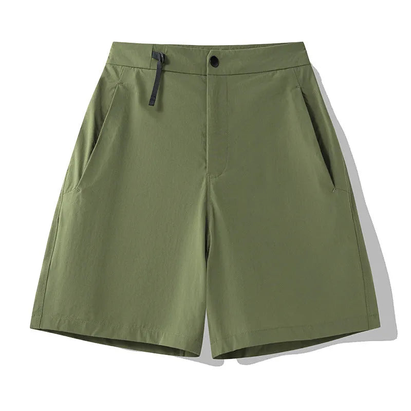 Men's solid colour quick-dry sports shorts with elastic construction for running and climbing.