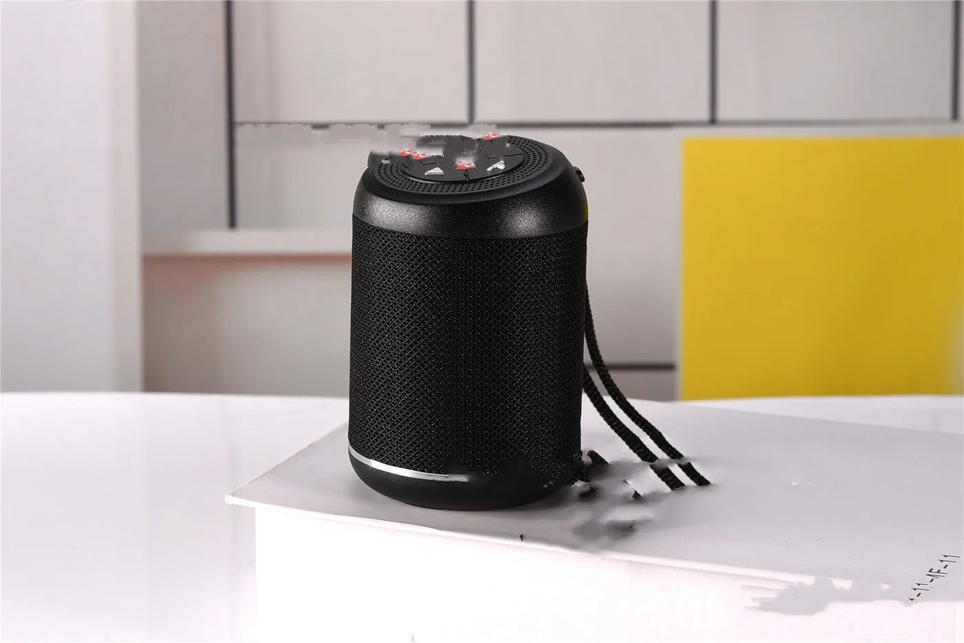 Portable outdoor Bluetooth subwoofer speaker shown in available colours: black, blue, camouflage, light blue, red, or silver.