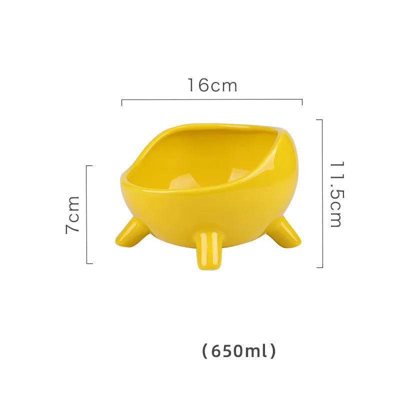 Green ceramic pet food bowl with four-legged base and rounded arc design