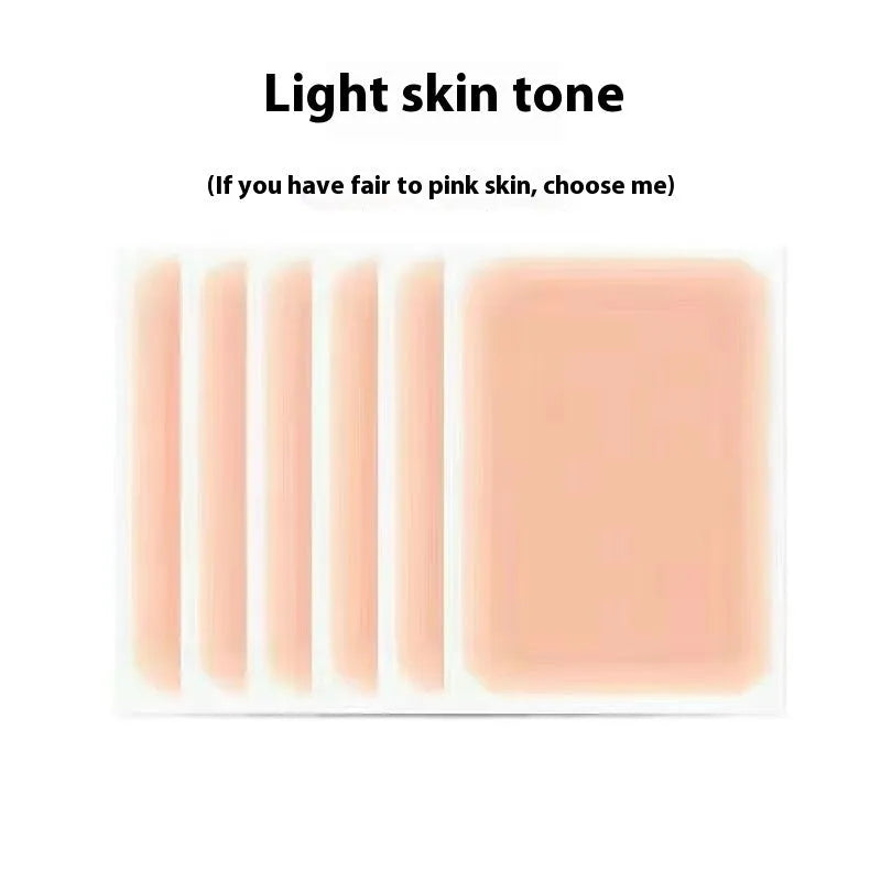 Pack of adhesive tattoo cover patches in various skin tone colours on a white background.