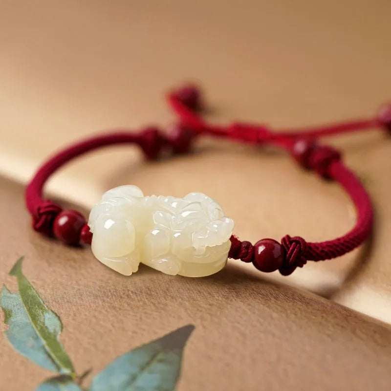 Women's Hetian jade bracelet with black and red braided ropes in Chinese style