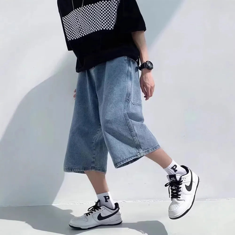 Men's washed blue denim cropped shorts with high waist and straight leg design