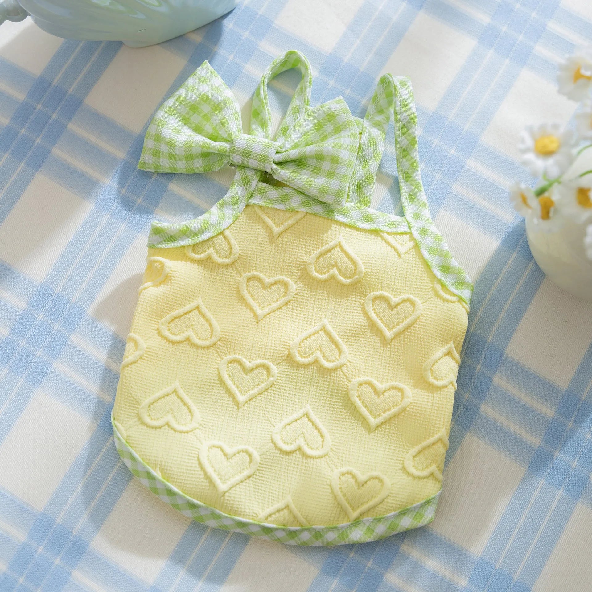 Small dog vest with heart texture and bow suspenders in blue, pink, or yellow with elastic sides