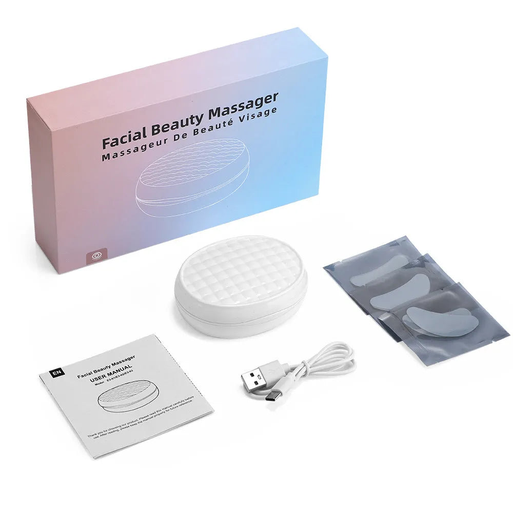 White wireless red light and EMS eye and face massager beauty device