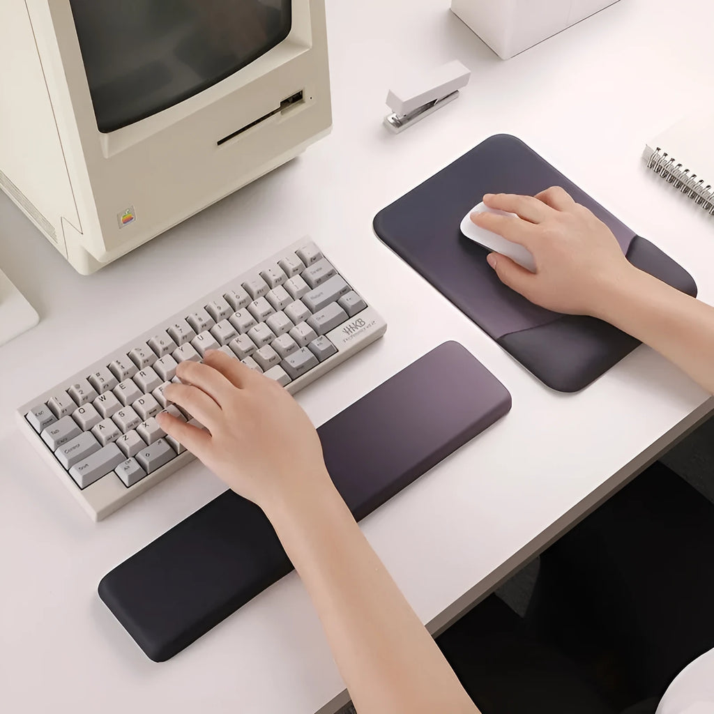 Square silicone wrist support mouse pad with cloth surface measuring 250x180mm