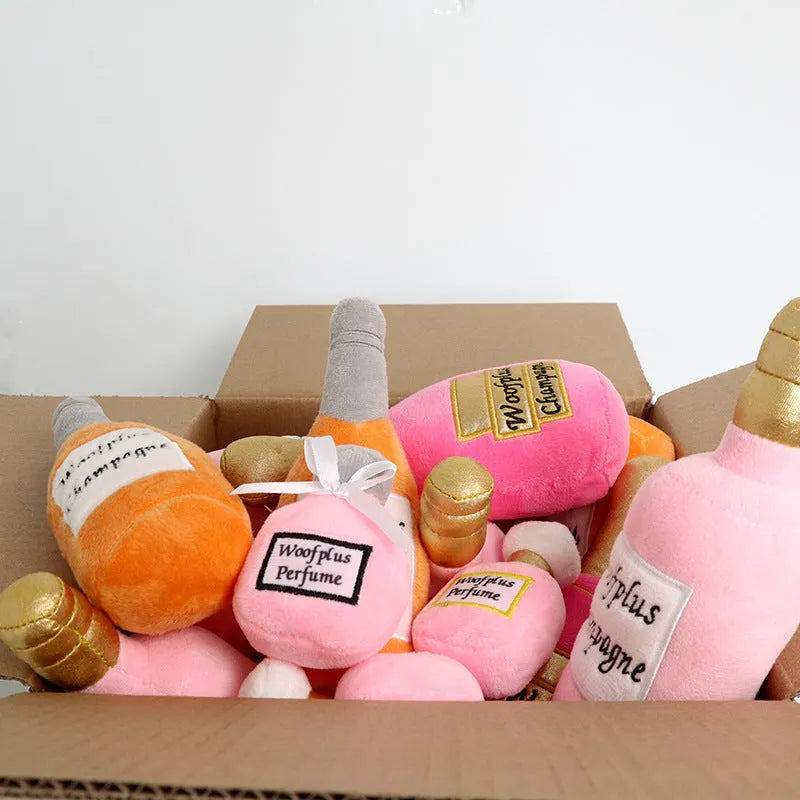 Plush wine bottle shaped dog toy in assorted colours including green, orange, red, black, coffee and white