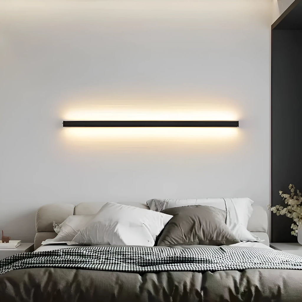 80cm long black LED wall lamp with touch control for three light colours on a white wall.