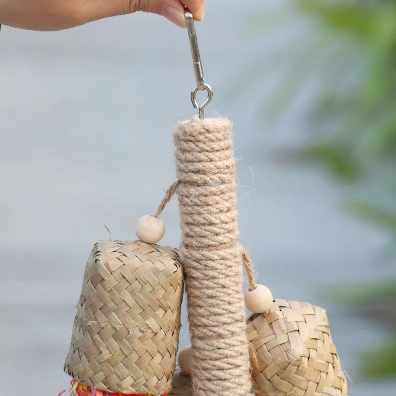 Natural wood and sisal rope parrot foraging toy with colourful shredded paper measuring 15cm by 35cm