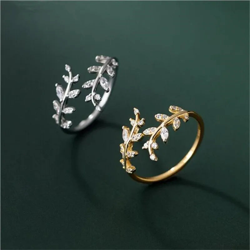 Geometric copper branch leaf ring for women in gold or silver electroplated finish.