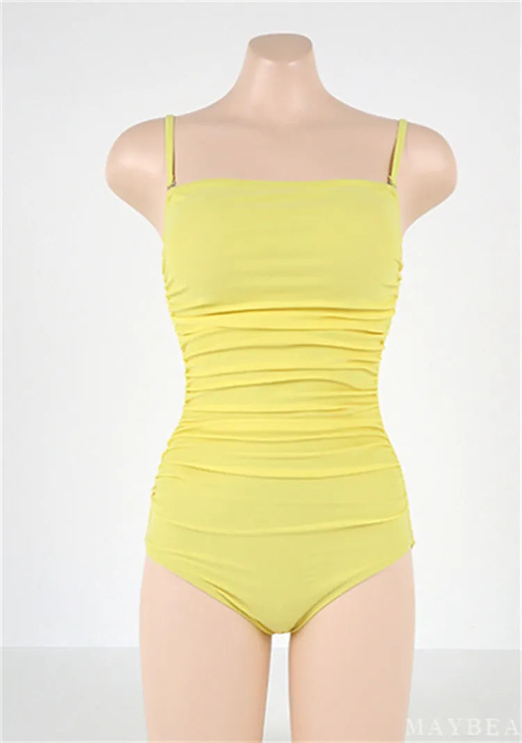 Sling style one-piece swimsuit with belly pleats in blue colour