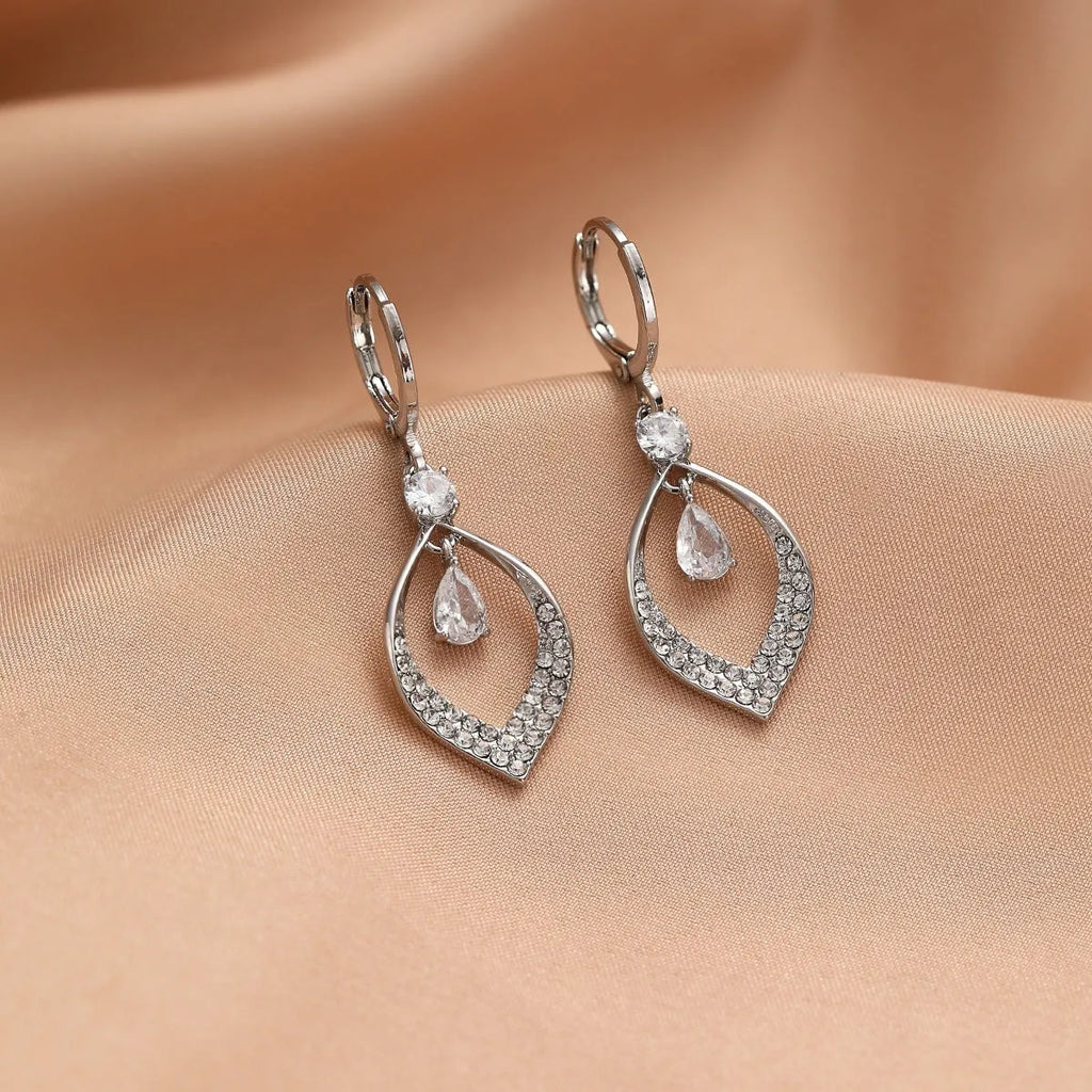 Gold and silver coloured zircon water drop tassel earrings with a tear-drop shape.