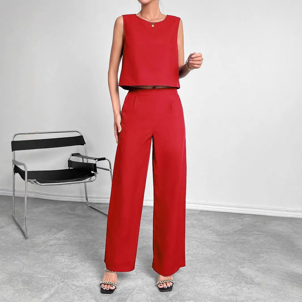 Women's red polyester two-piece set showing sleeveless round neck top with wide leg pants