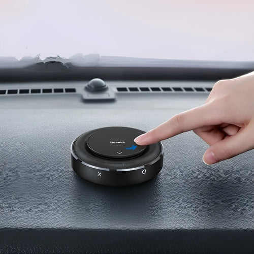 Aluminium car fragrance holder on dashboard with replaceable scent tablets