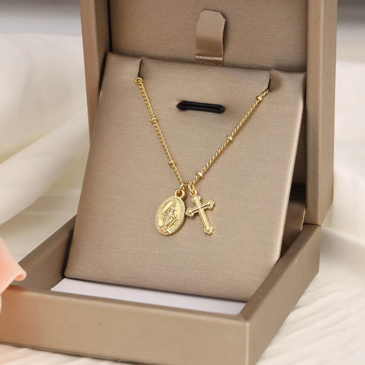 Gold Virgin Mary and cross geometric pendant necklace on a chain