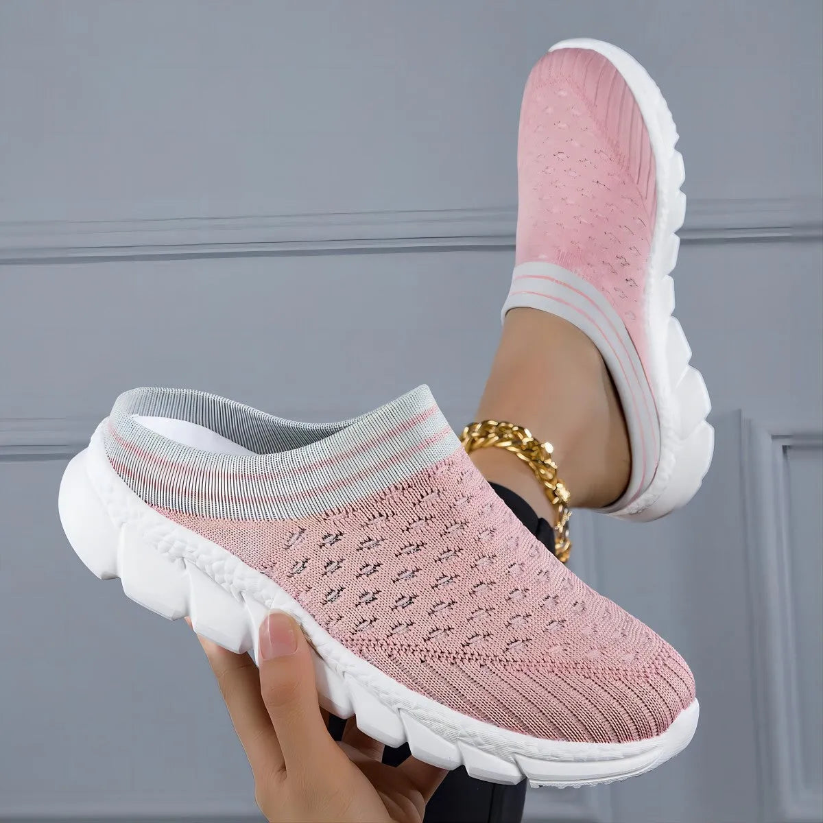 Women's striped Flyknit slipper shoes in black, pink, or purple with hollowed-out sewing line details