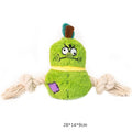 Green interactive dog toy with plush rope knot and white molar tooth chew element
