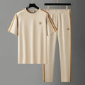 Men's ice silk style short sleeve suit in apricot, black, or blue with matching pants