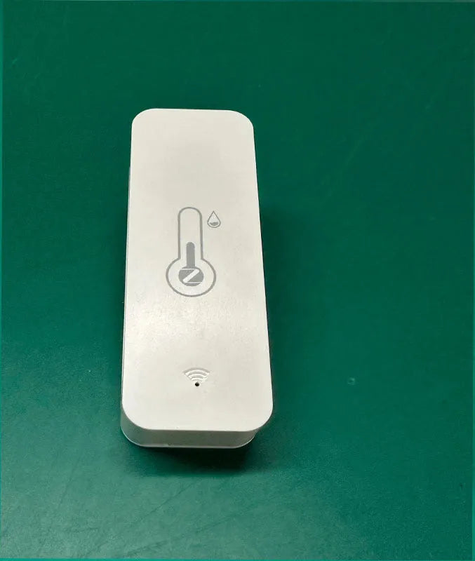 Compact white ABS plastic WiFi Zigbee temperature and humidity sensor for Tuya smart homes.
