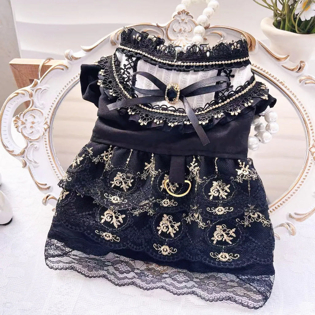 Golden Gothic princess skirt costume for a small dog on a mannequin.